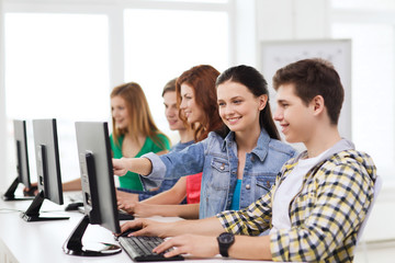 Wall Mural - male student with classmates in computer class