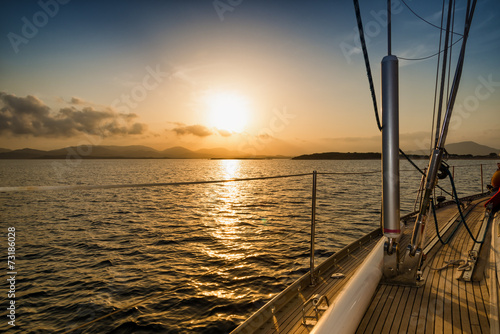 Naklejka nad blat kuchenny sunset on the sea from the sail boat