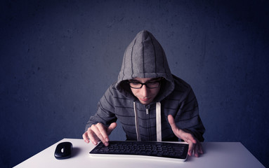 Fototapete - Hacker working with keyboard on blue background