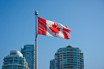 Wall Mural - Canadian flag on the Vancouver skyscrapers background