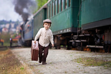 Boy, Dressed In Vintage Shirt And Hat, With Suitcase