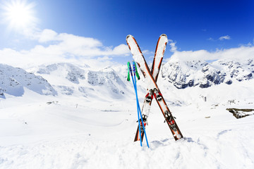 Fototapete - Skiing , mountains and ski equipments on ski run