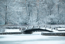 Old Wooden Bridge Under Snow, Winter Landscape