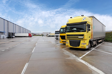 Wall Mural - Yellow truck in warehouse