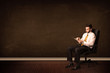 © ra2 studio - Businessman holding high tech tablet on background with copyspac