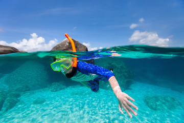 Poster - Little boy swimming in ocean