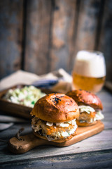 Wall Mural - Rustic fish burgers with coleslaw and beer