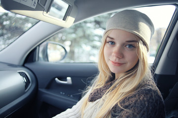 beautiful young blond teen in the car