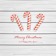 Wall Mural - Christmas cane on wooden background