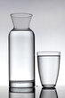 glass and a carafe filled with water