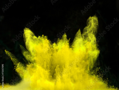 launched colorful powder over black