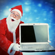 © Sabphoto - Santa Claus with Laptop