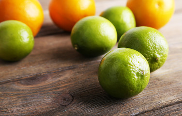 Ripe citrus on wooden background