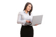 © innervisionpro - Attractive office worker holding and looking at laptop screen
