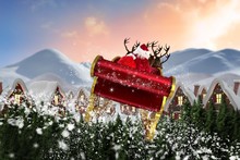 Composite Image Of Santa Flying His Sleigh
