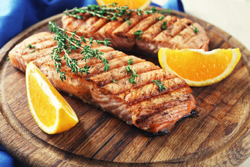 Wall Mural - Grilled salmon  and orange slices