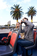 Wall Mural - open top bus couple
