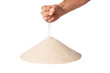 © twixx - fist with falling sand on pile