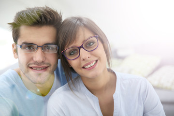 Canvas Print - Portrait of young couple with eyeglasses on