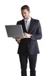 © WavebreakMediaMicro - Smiling businessman standing using laptop