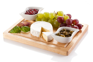 Wall Mural - Cheese on cutting board