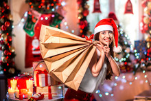 Young Woman With Shopping Bags On Christmas