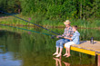 © Sergey Nivens - boy and his father fishing togethe