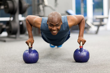 Wall Mural - young african man doing push-ups exercise