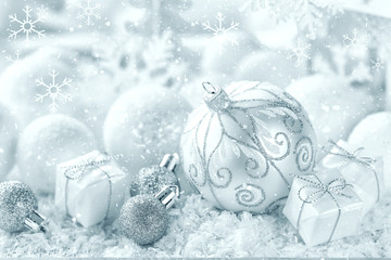 Wall Mural - Christmas ornaments on snow