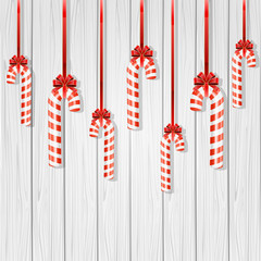 Wall Mural - Christmas canes on wooden background