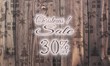 © Thomas R. - wooden Christmas discount 30 percent off label with presents