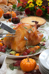 Carving Roasted Turkey on Harvest Table