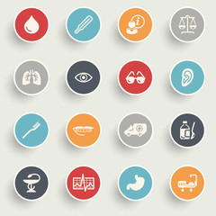 Sticker - Medicine icons with color buttons on gray background.