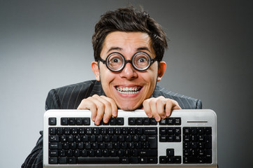 computer geek with computer keyboard