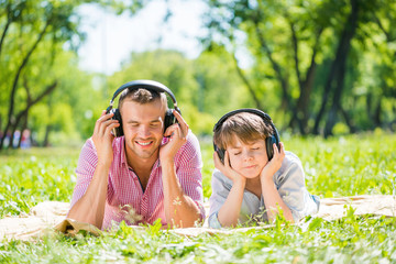 Wall Mural - Father and son in park