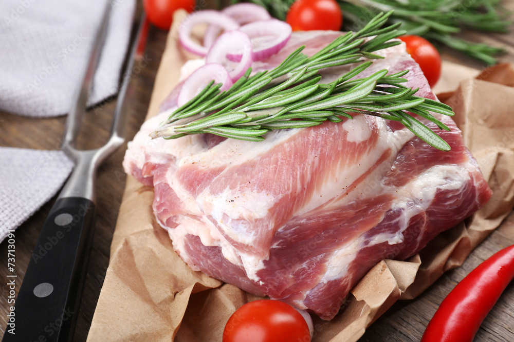 Raw meat on wooden table, close-up