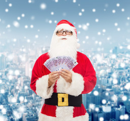 Canvas Print - man in costume of santa claus with euro money