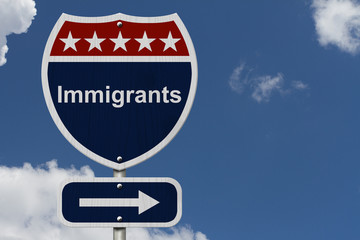 Wall Mural - Immigrants this way sign