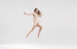 © konradbak - Talented ballet dancer in athletic jump