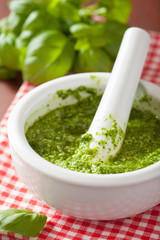 Sticker - pesto sauce and ingredients over red napkin