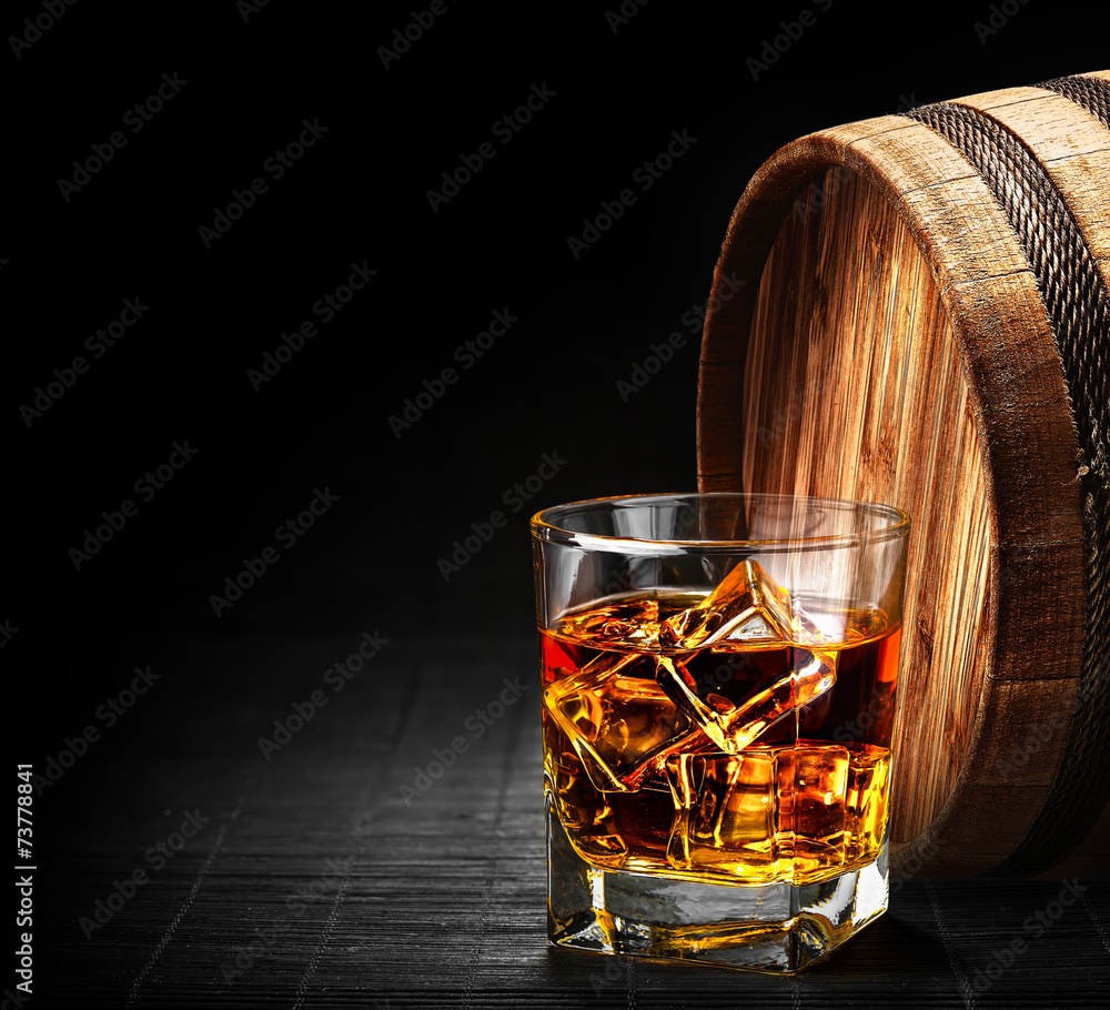 Glass of cognac on the vintage wooden barrel - obrazy, fototapety, plakaty 