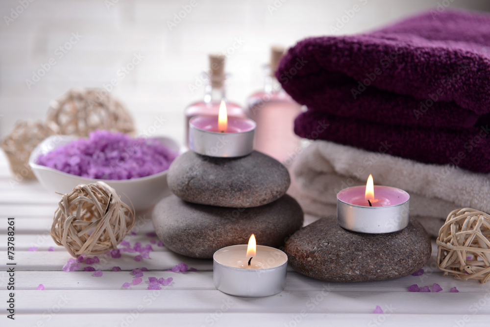 Composition of spa treatment on table on white background