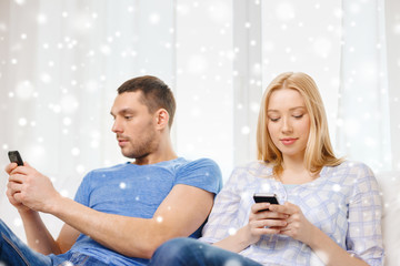 Poster - couple with smartphones at home