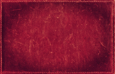 Red grunge background from distress leather texture