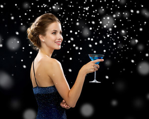 Poster - smiling woman holding cocktail