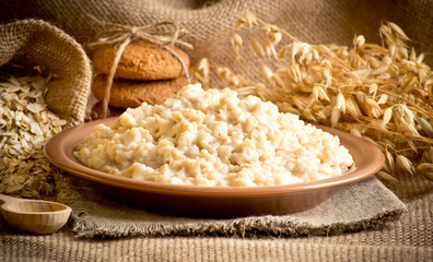 Wall Mural - Oatmeal, oat flakes, cookies and spikelets