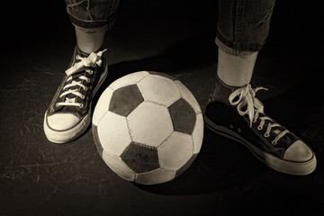 Poster - Soccer ball on black background