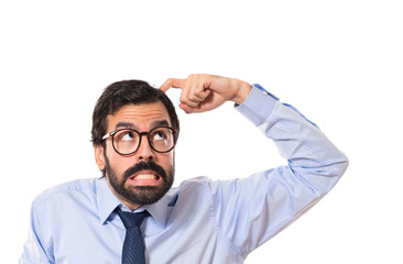 Wall Mural - Businessman thinking over white background