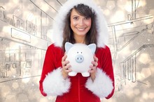 Smiling Brunette In Santa Claus Holding A Piggy Bank