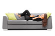 © Ljupco Smokovski - Girl lying on a sofa and talking on vintage phone